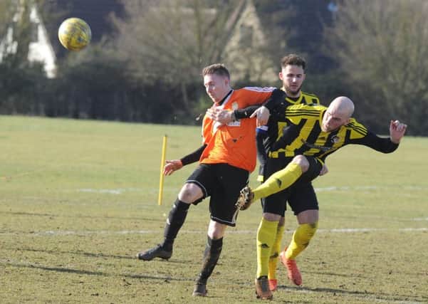 Action from a recent Thorney (orange) match.