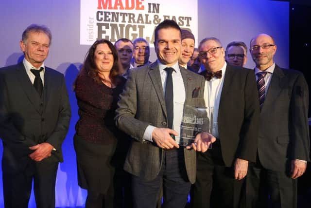 Westcombes  Andrew Lesiw and staff with the award presentation. Pic - Richard MarshamRMG Photography - Tel : 07798 758711www.rmg-photography.co.uk