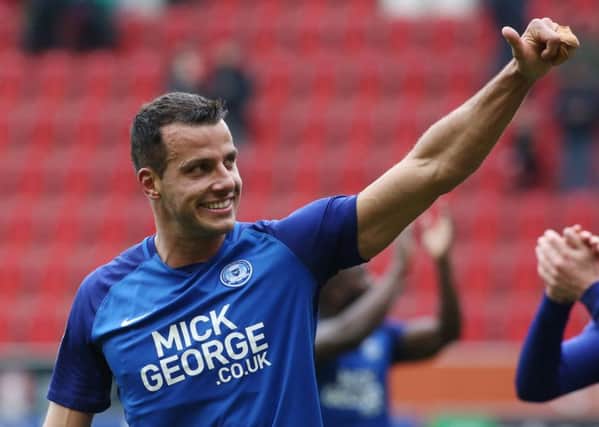 Posh defender Steven Taylor is all smiles after the 1-1 draw at Rotherham. Photo: Joe Dent/theposh.com.
