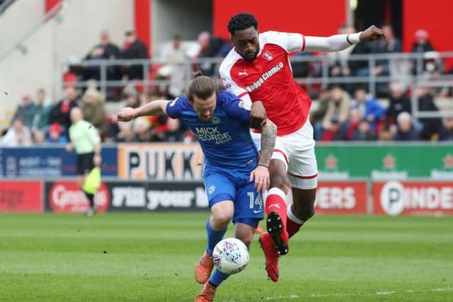 Posh striker Jack Marriott baPosh striker Jack Marriott battles with Rotherham's Semi Ajayi. Photo: Joe Dent/theposh.com.
