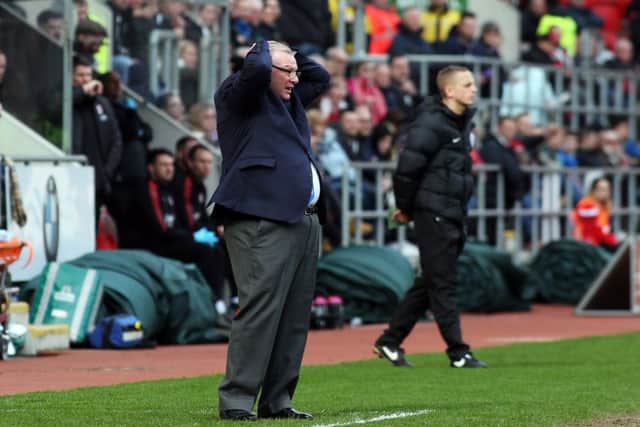 Posh manager Steve Evans rues a missed first-half chance at Rotherham. Photo: Joe Dent/theposh.com.