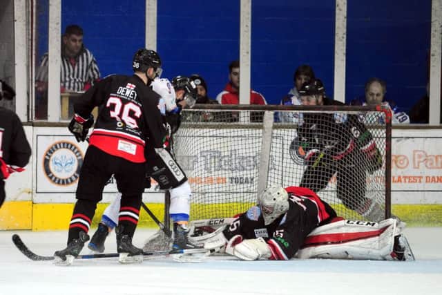Phantoms star Nathan Salem finally forces the puck past brilliant Basingstoke netminder Dean Skinns. Photo: Alan Storer/Feral Marmot Films.
