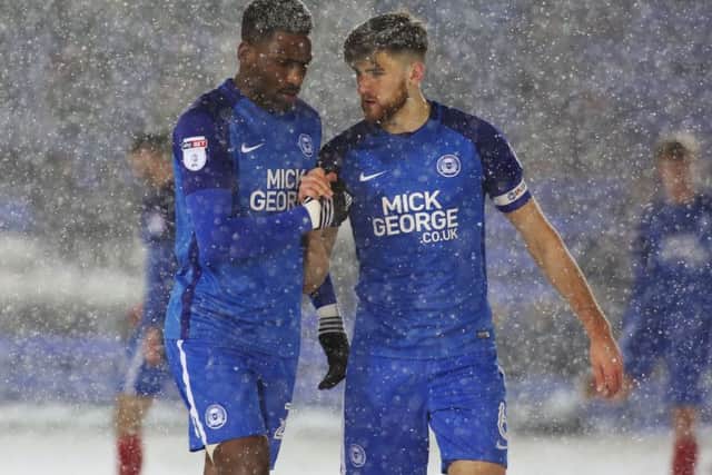 Club captain Jack Baldwin (right) is back in the Posh squad tomorrow.