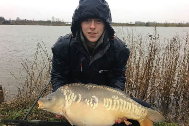 Lewis Bellamy with his big carp.