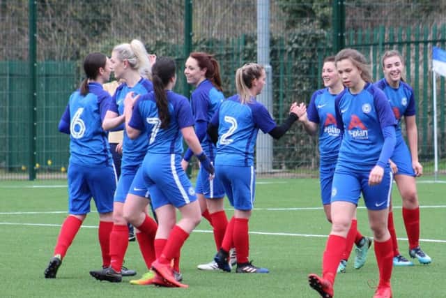 Posh Ladies celebrate scoring against Oadby. Picture: Gary Reed