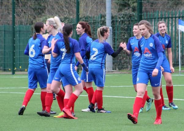 Posh Ladies celebrate scoring against Oadby. Picture: Gary Reed