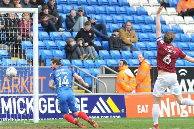 Posh top scorer Jack Marriott saw this headed 'goal' wiped out for offside. Photo: David Lowndes.