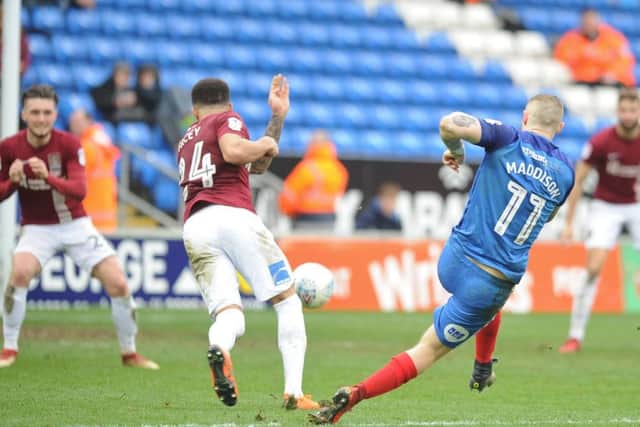 Marcus Maddison in action for Posh.