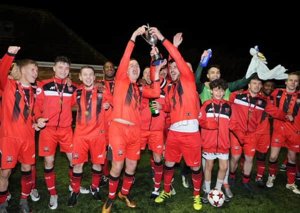 West Raven celebrate their cup final success. Picture: David Lowndes