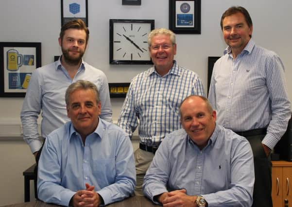 Chief executive Seb Maley, top left, with Qdos board of directors.