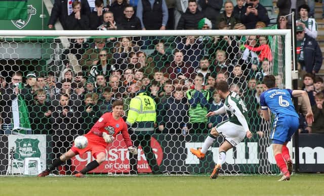Graham Carey of Plymouth Argyle scores the winning goal from the penalty spot past Conor O'Malley of Peterborough United - Mandatory by-line: Joe Dent/JMP - 07/04/2018 - FOOTBALL - Home Park - Plymouth, England - Plymouth Argyle v Peterborough United - Sky Bet League One