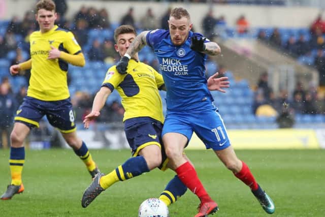 Marcus Maddison in action for Posh.