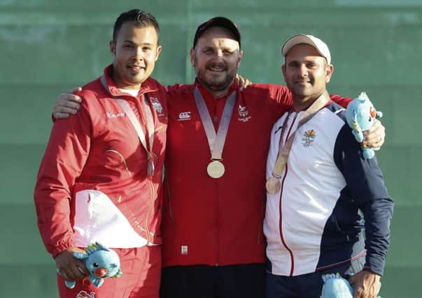 Silver medallist Aaron Heading ( left) with gold medallist  Michael Wixey of Wales (centre) and bronze medallist  Brian Galea of Malta (right). Picture: AP Photo/Tertius Pickard