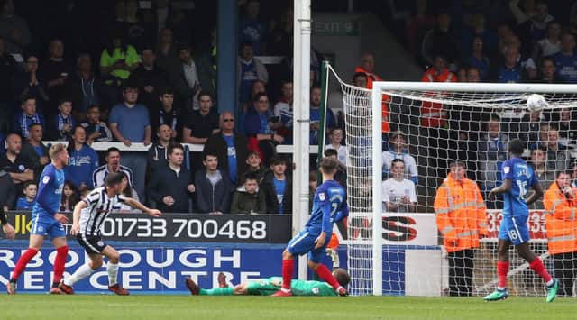 Ian Henderson scores the only goal of the game for Rochdale at Posh.  Photo: Joe Dent/theposh.com.