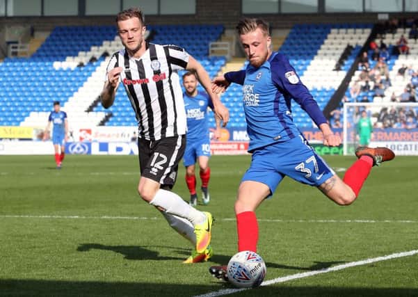 George Cooper on the ball for Posh against Rochdale. Photo: Joe Dent/theposh.com.
