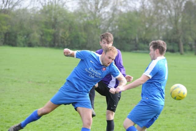 Action from a 6-2 win for Whittlesey Athletic Reserves (blue) against Rippingale & Folkingham. Photo: David Lowndes.