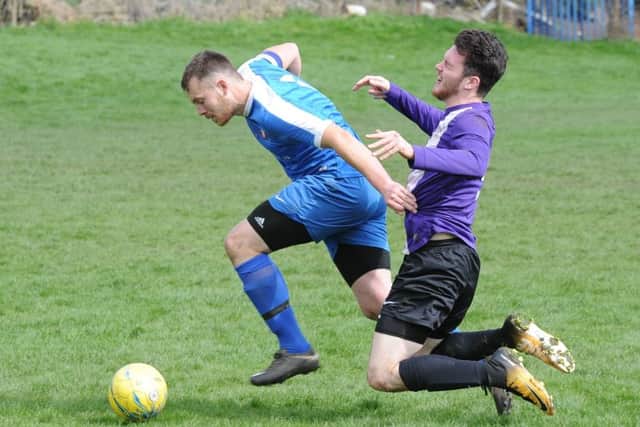 Action from Whittlesey Athletic Reserves' (blue) 6-2 win over Riipingale & Folkingham. Photo: David Lowndes.