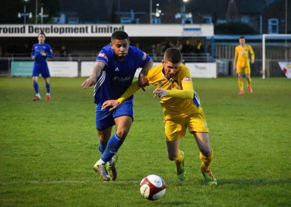 Andre Wiliams (left) in action for Peterborough Sports against Spalding. Photo: James Richardson.