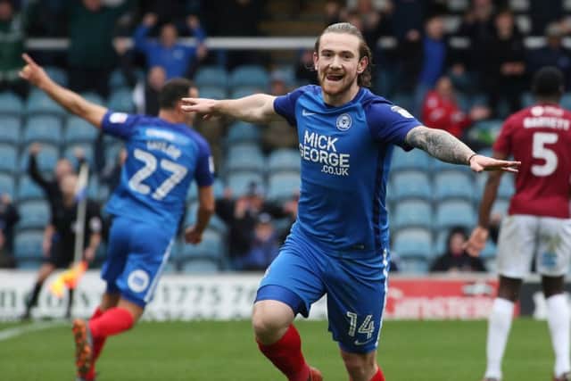 Jack Marriott celebrates one of his 32 goals for Posh this season.