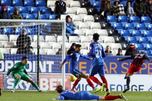 Bradley Dack (right) scores for Blackburn at Posh in December.