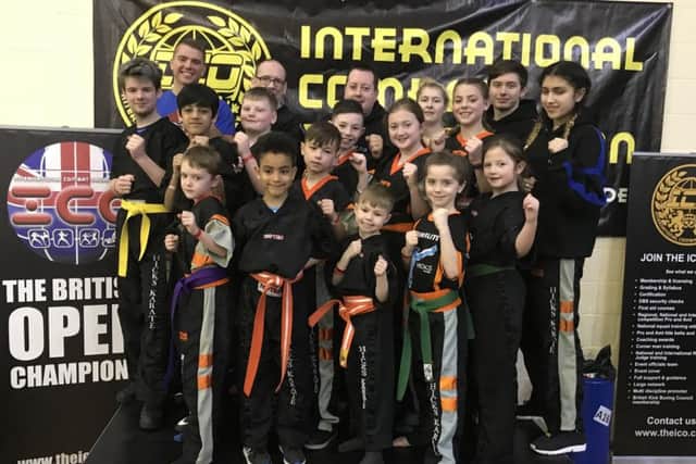 The Hicks Karate School at the British Open. From the left are, back Tomas Butvilas, David Prior, Andrew Hicks, Atlanta Hickman, Aaron Dickerson, middle, Kye Prior, Shiv Panchal, Warren Bothamley, Denas Jankauskas, Aaron Leonard, Lucy Hicks, Jolie Franks, Elise Ward, front, Oliver Profitt, Joell Celaire, Joshua Leonard, Sophie Doyle and Sophie Hicks.