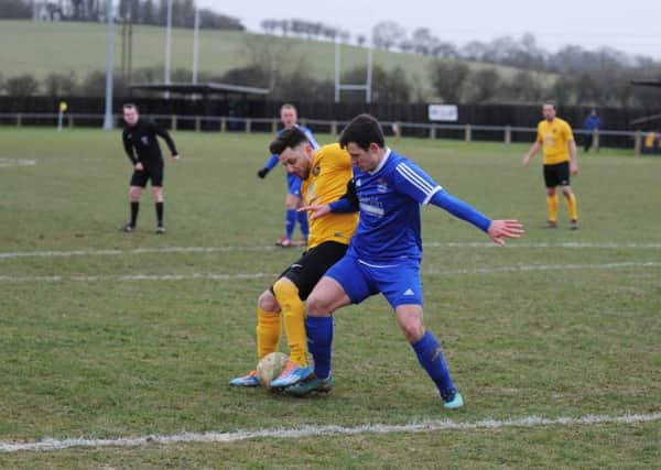 Yaxley (blue) need to bounce back to winning ways against St Andrews.