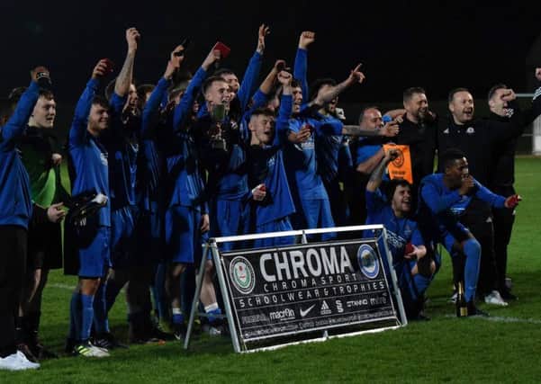 Yaxley celebrate success in the United Counties League Reserve Cup. Photo: Chantell McDonald. @cmcdphotos.
