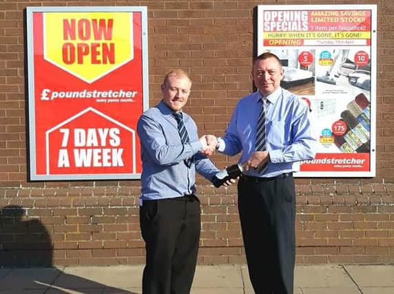 Deeping Shopping Centre manager, Kevin Smith, welcomes Poundstretcher and its area manager, Ben Eaton.