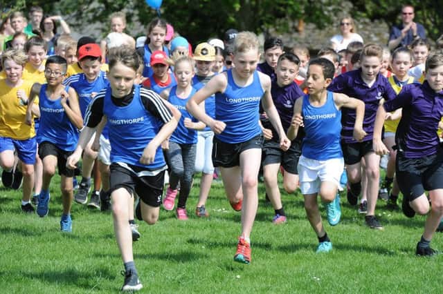 Barnack primary school fun runs. Action from the races EMN-180421-171520009