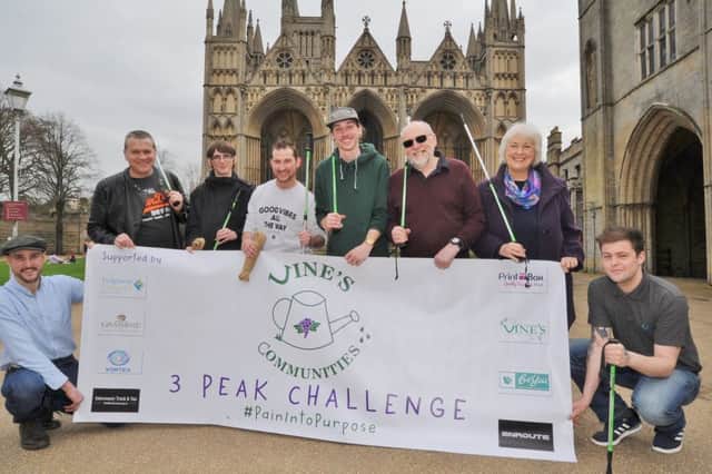 Joe Vine (front left kneeling) with his trustees and hikers taking part in trhe Three Peaks Challenge EMN-180414-183925009