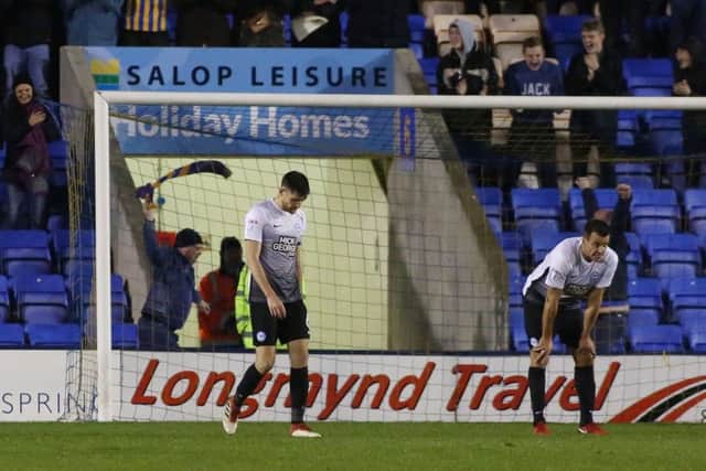 Posh defenders Jack Baldwin (left) and Steven Taylor after Posh went 2-1 down at Shrewsbury. Photo: Joe Dent/theposh.com.
