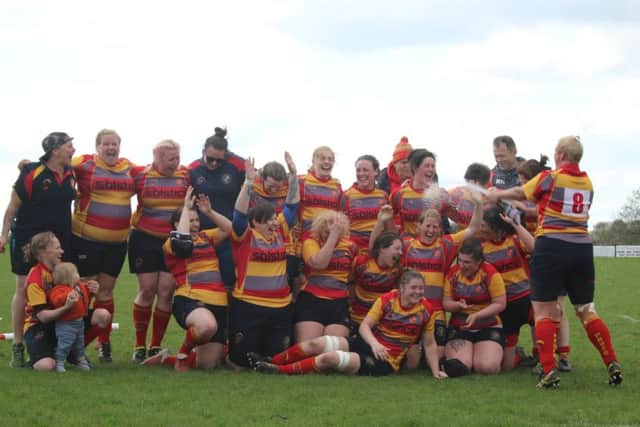 Borough Ladies celebrate their title win.