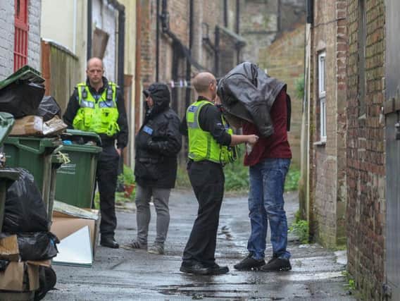 Police raid the premises in Wisbech. Photo: Terry Harris