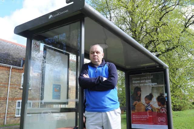 Andrew Hensley at the Botolph's Green bus stop which is due to be de-commissioned EMN-180425-130046009