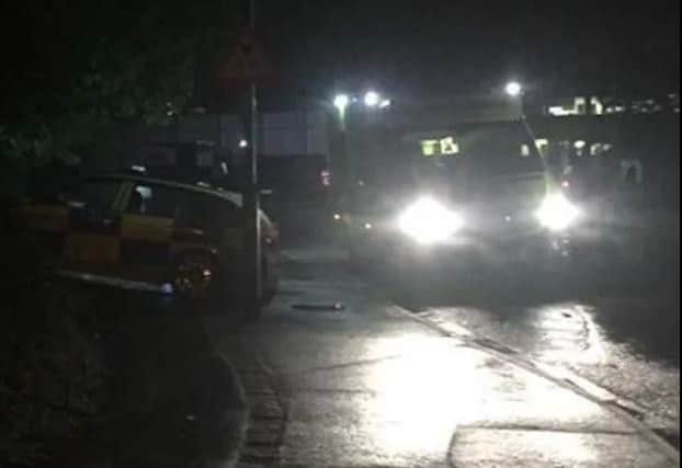 Police and ambulance crews at the scene of the incident in Celta Road. Photo: Paul Hempenstall