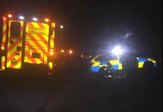 Police and ambulance crews at the scene of the incident in Celta Road. Photo: Paul Hempenstall