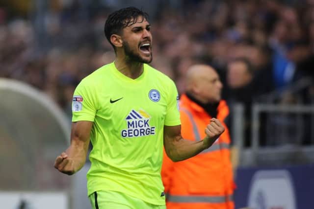 Posh should build the defence around Ryan Tafazolli.