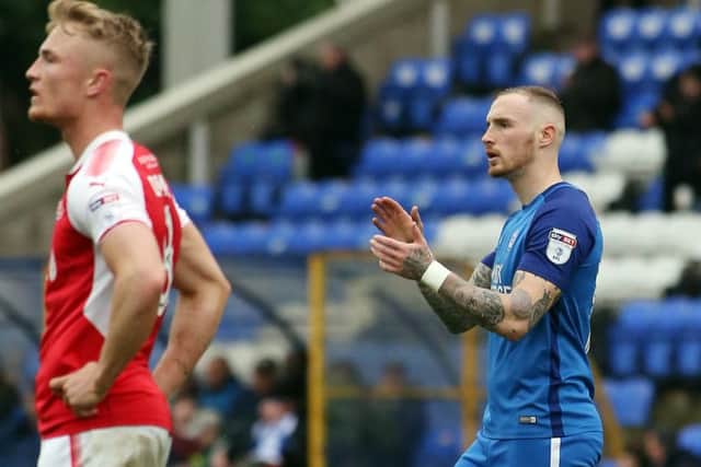 Marcus Maddison applauds the Posh fans after he is substituted against Fleetwood. Photo: Joe Dent/theposh.com.