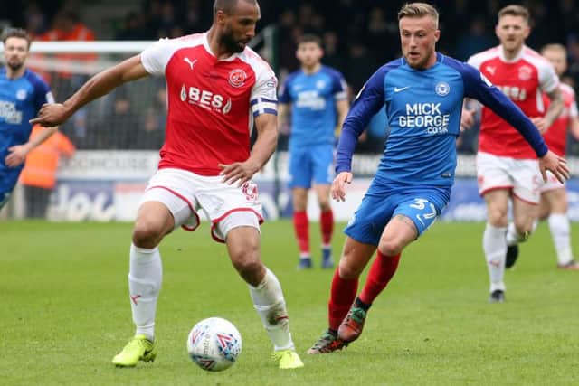 Posh goalscorer George Cooper closed down Nathan Pond of Fleetwood. Photo: Joe Dent/theposh.com.