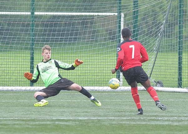 Kyrie Foster scores for Netherton against Peterborough Sports Reserves. Photo: David Lowndes.