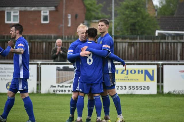 Peterborough Sports players celebrate a goal against Corby. Photo; James Richardson.