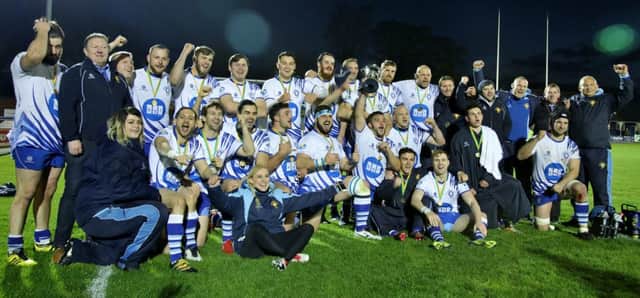 The Lions celebrate their East Midlands Cup win last season.