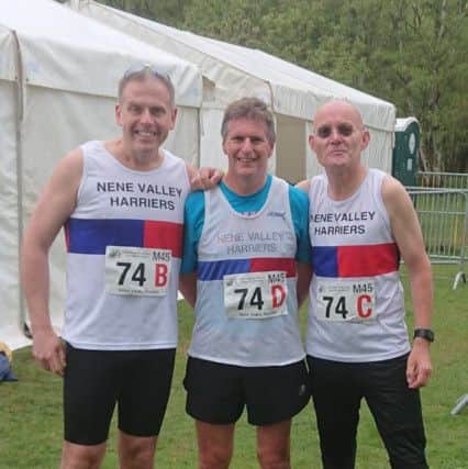 Three members of  Nene Valleys British Masters road relay team. From the left are Darryl Coulter, Paul Parkin and Barry Warne.