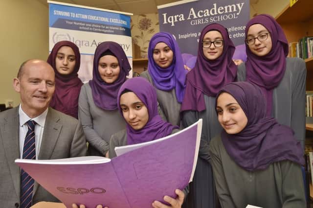 Headteacher Dr Michael Wright with pupils at Iqra Academy