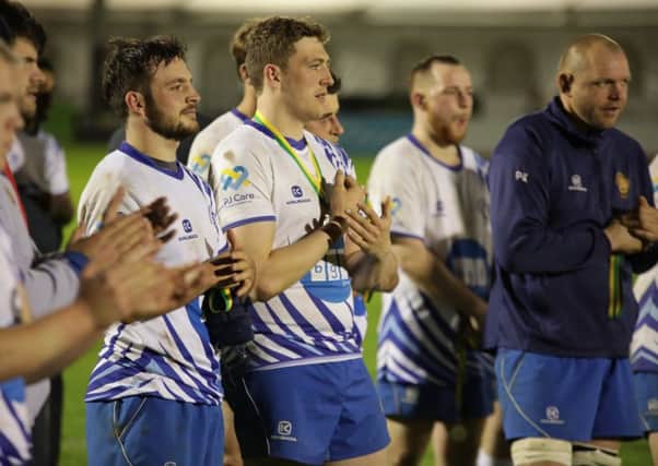 Lions players applaud Bedford Athletic after the East Midlands Cup final. Picture: Mick Sutterby