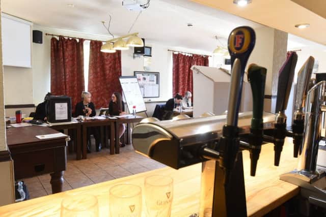 You can legally vote drunk...and this polling booth is conviniently in a pub