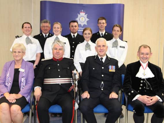 The lifesaving group of officers received their commendations from dignitaries at an awards ceremony in Huntingdon