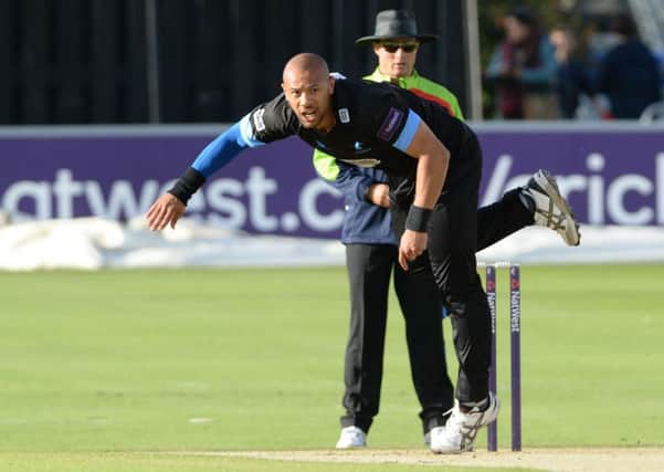 Tymal Mills in action for Suffolk.