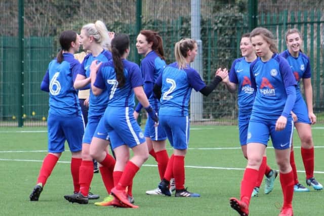 Posh Ladies are celebrating a title win.