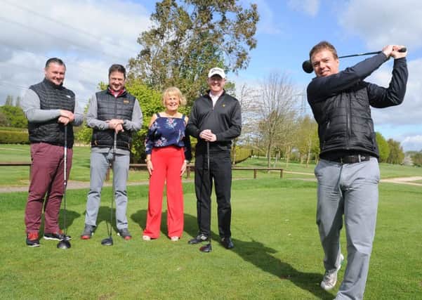 Come Fly with Us Again charity golf tournament at Elton Furze. Pictured are   Andy Stubbs, Simon Hodgson, Iain Clarke and Adam Chesters (from Air Ambulance) teeing off with orgainser  Cherie Cawood EMN-180426-190021009